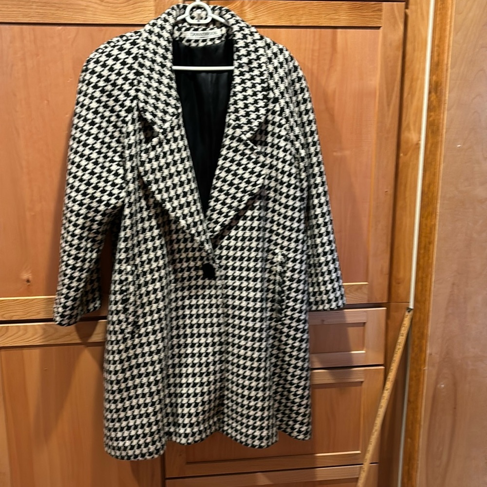 A wool swing coat for women.  Black and white. Size 12.  DONNYBROOK